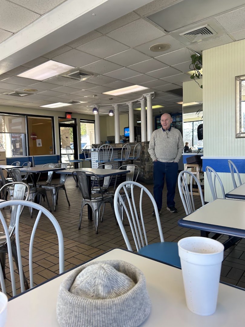 Warm restaurant space with a relaxed, everyday feel.